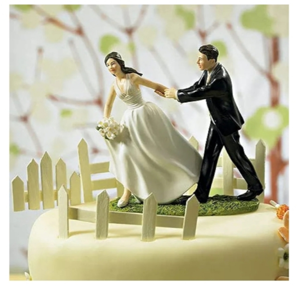 Elegant Wedding Cake Topper with Bride and Groom